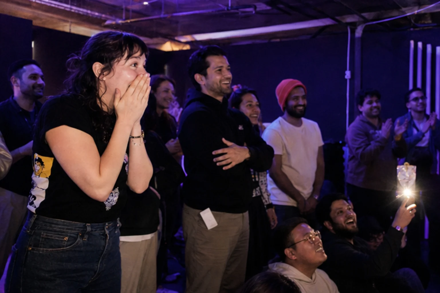 A launch crowd reacting to a live product demo