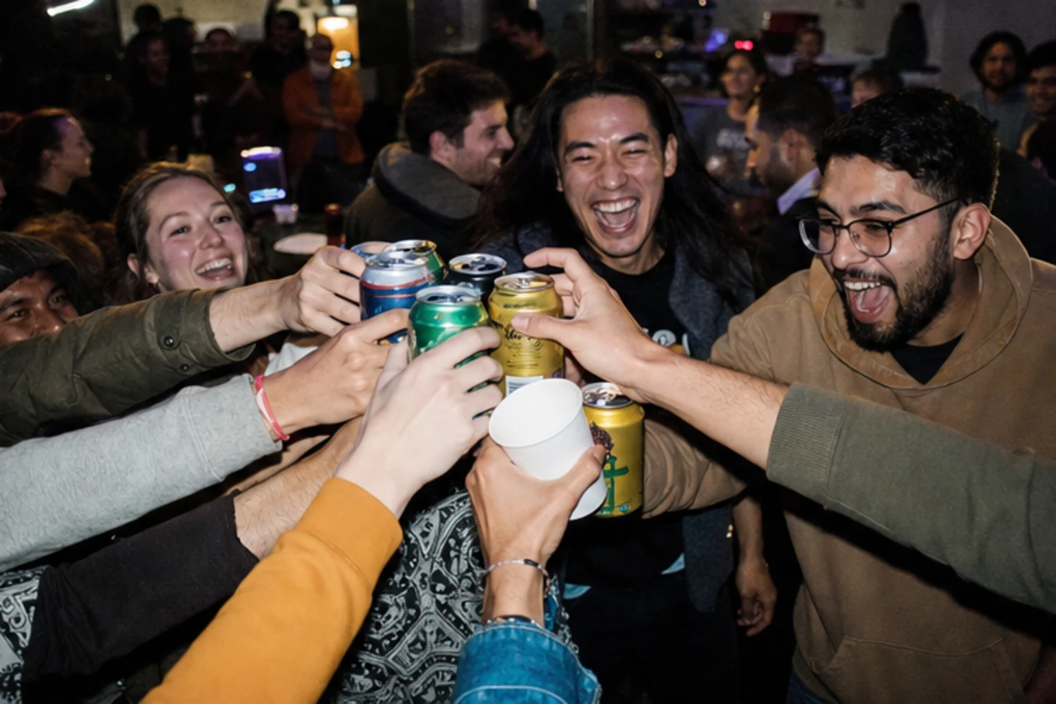 Builders and friends raising a post-launch toast