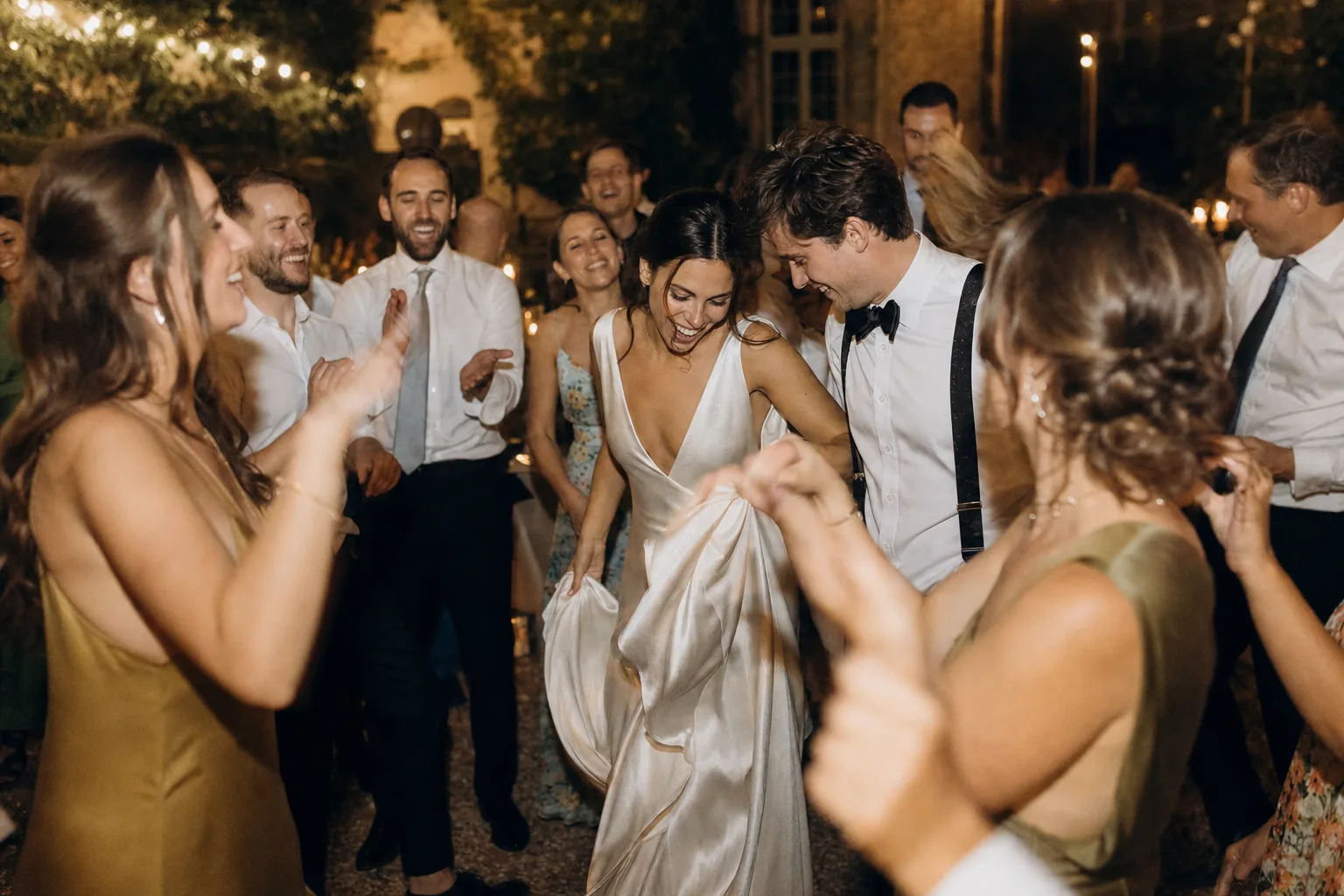 Wedding guests filling the dance floor