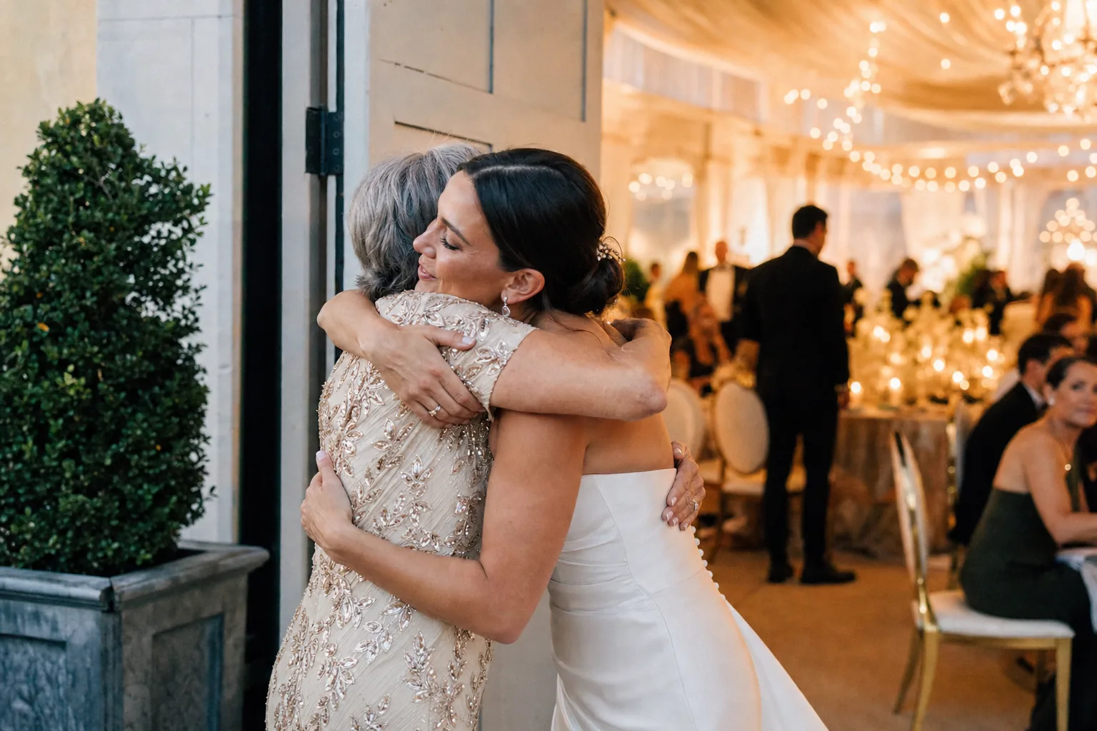 Two wedding guests sharing a quiet moment